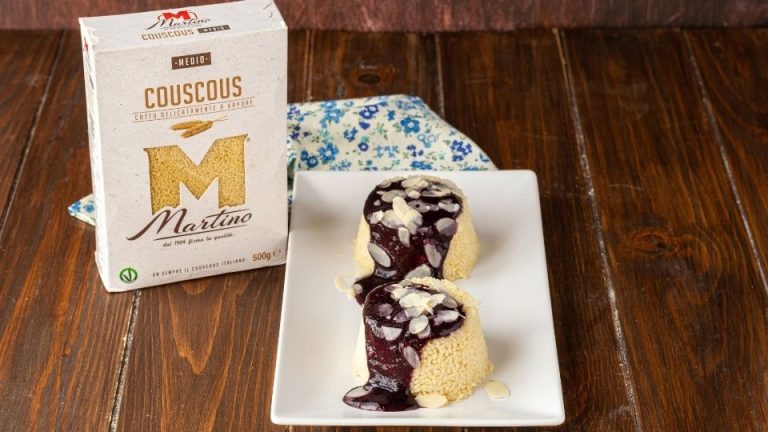 Couscous cakes with blueberry sauce